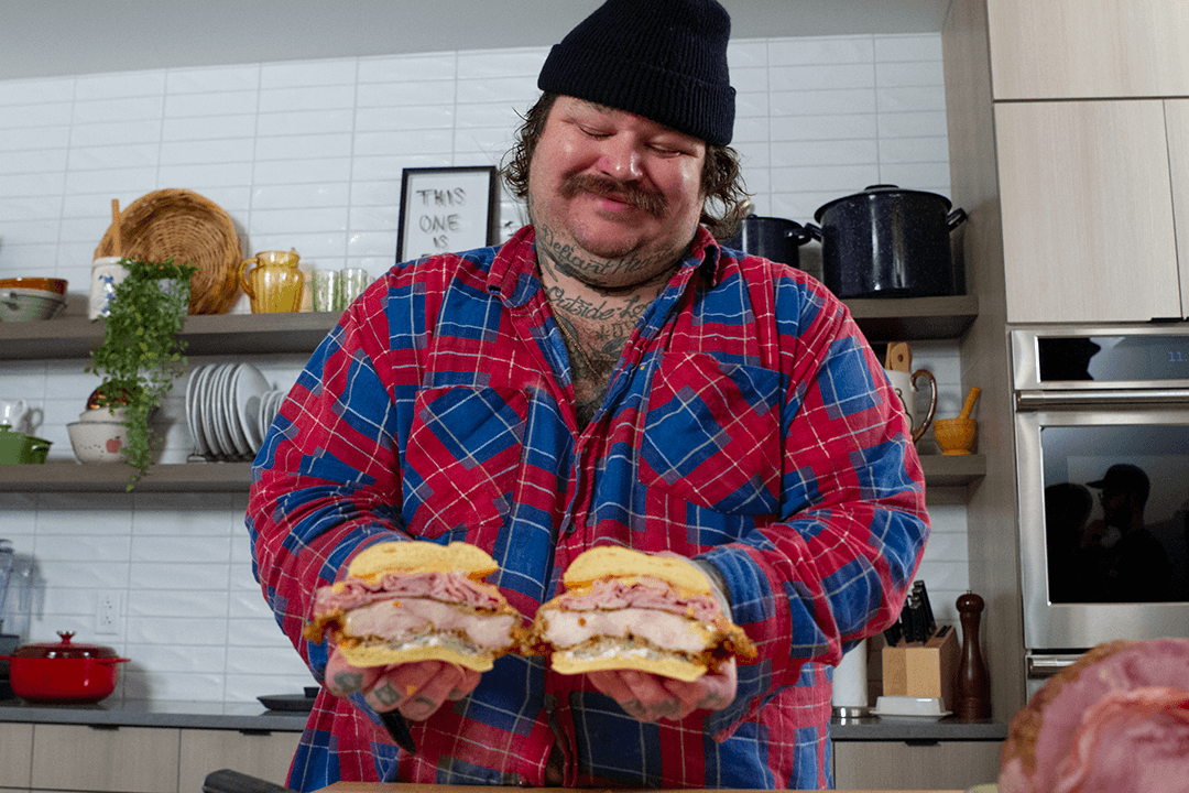 Matty Matheson with a Fried Chicken Sandwich