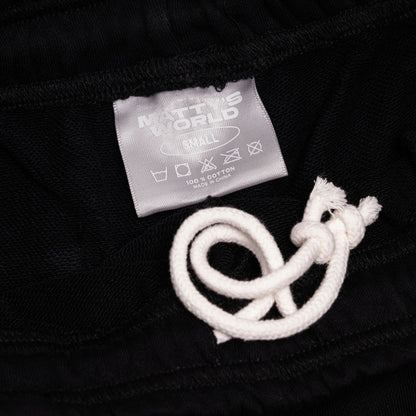 Black fabric with a white rope tie and 'Matt's World' label on a black background