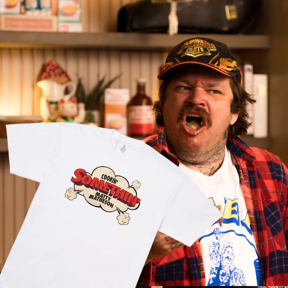 Cookin' Somethin' Original T-Shirt in white Matty Matheson in background mouth full