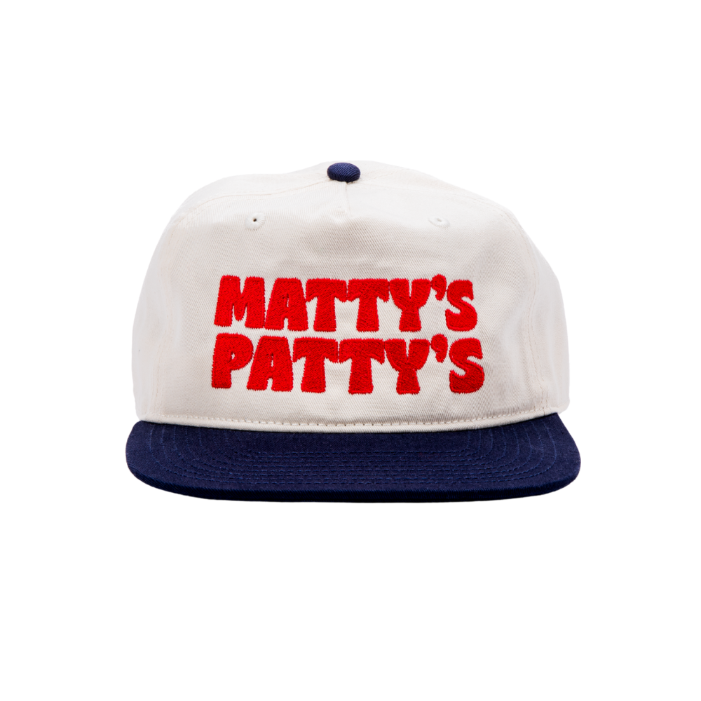 White cap with red text 'MATTY'S PATTY'S' and blue bill on a white background
