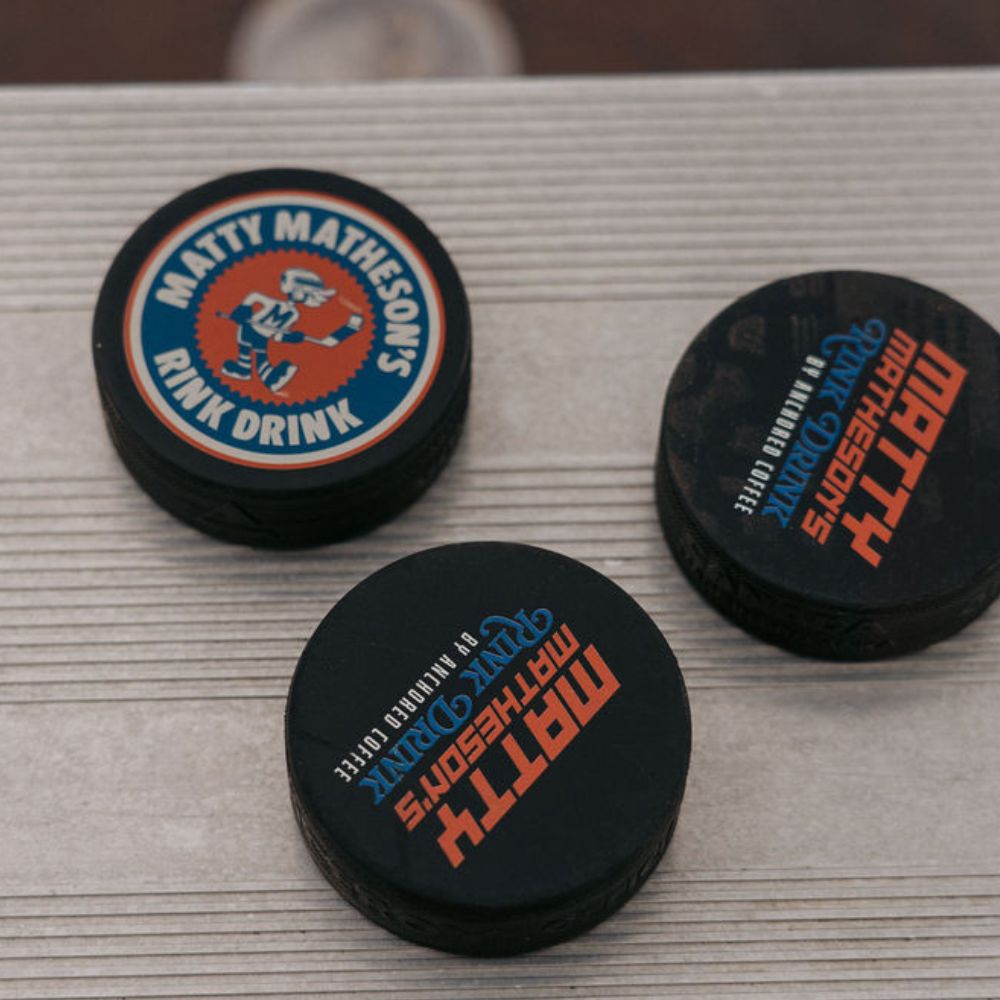 Anchored x Matty Rink Drink Hockey Puck Anchored Coffee Hockey PuckMatty Matheson