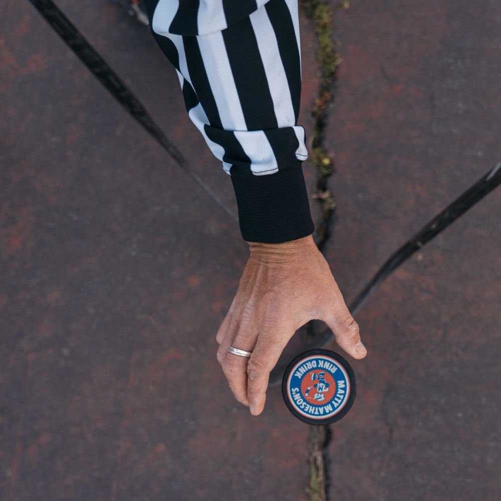 Anchored x Matty Rink Drink Hockey Puck