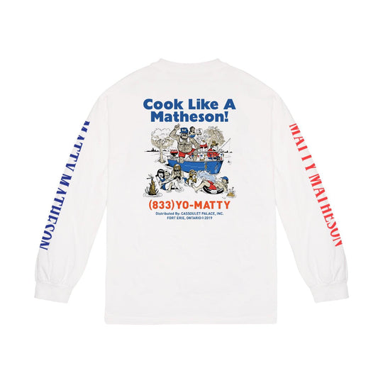 Cook Like a Matheson Long Sleeve Shirt featuring a white cotton design with cartoon cooking-themed graphics, blue text logo, and red sleeve prints, displaying a playful culinary scene with cooking characters and phone number (833)YO-MATTY